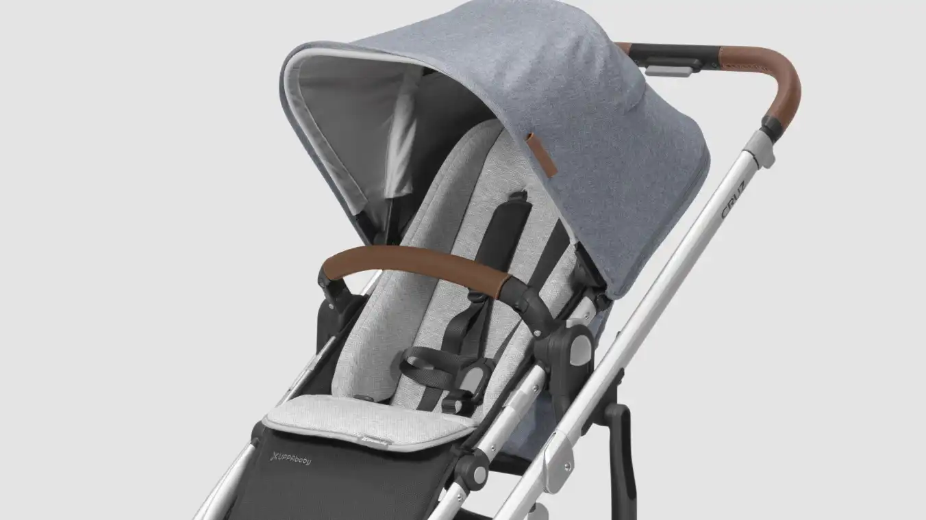 Infant SnugSeat attached to Cruz stroller Toddler Seat