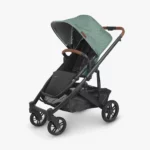 Cruz V2 stroller (Gwen - green mélange, carbon frame, saddle leather) with included Toddler Seat