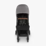 The Minu V2 (Greyson) features a seat that holds up to 50 lbs and a five-point, no rethread harness