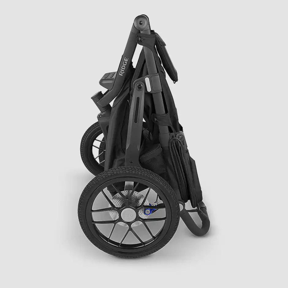 The Ridge stroller (Jake) features a one-handed fold and stands when folded