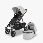 Vista V2 stroller (Anthony - white and grey chenille, carbon frame, chestnut leather) with Toddler Seat and Bassinet, both included with the stroller