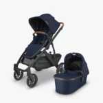 Vista V2 stroller (Noa - Navy, carbon frame, saddle leather) with Toddler Seat and Bassinet, both included with the stroller