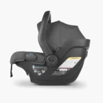 The Mesa V2 infant carrier (Greyson) includes a large, UPF 25+ hideaway canopy and a European Routing system for a secure install when installing without the base