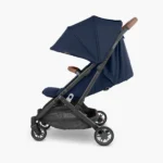 The Minu V2 (Noa) includes a zip-out, extendable canopy with UPF 50+ protection and multi-position adjustable leg rest