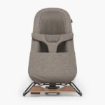 The Mira 2-in-1 bouncer (Wells) includes an adjustable padded harness and dual comfort seat with breathable mesh