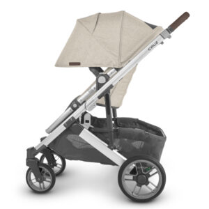 The Cruz V2 (Declan) includes a height-adjustable canopy (with mesh panels for ventilation) to accommodate growing children 