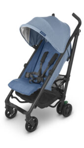 UPPAbaby G-LUXE stroller in Charlotte Coastal Blue Mélange showcasing its lightweight and portable design, perfect for city navigation and travel.