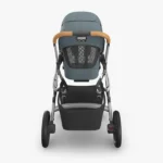 Parent view of Vista V3 (Callum) showcasing mesh backing of All-Weather Comfort Seat, Enhanced FlexRide Suspension system, and easy-access foot brake with visual indication