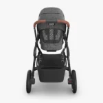 Parent view of Vista V3 (Greyson) showcasing mesh backing of All-Weather Comfort Seat, Enhanced FlexRide Suspension system, and easy-access foot brake with visual indication