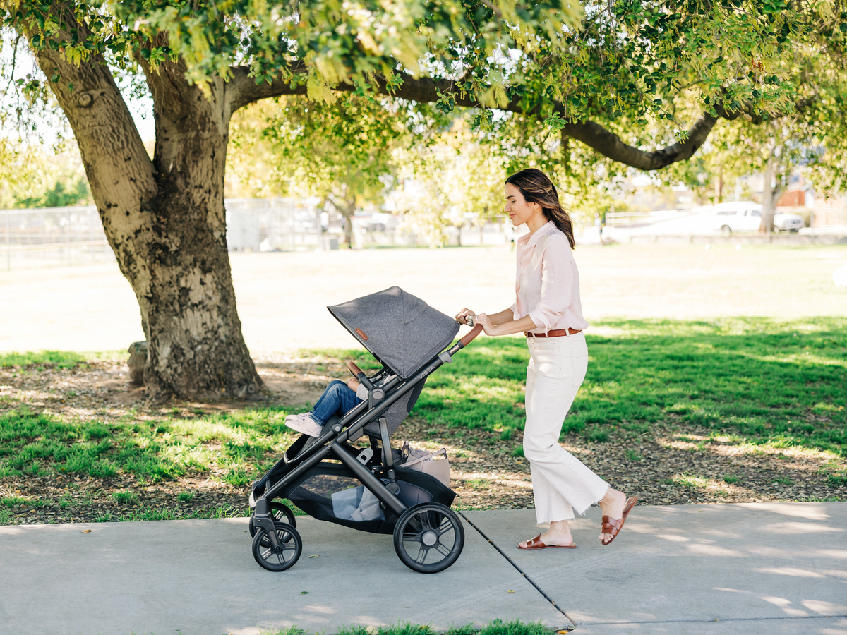 Mom strolls with child in Vista V3